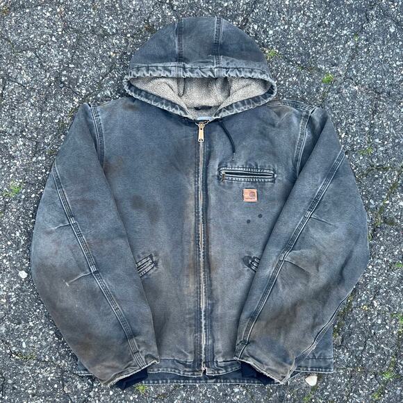 Vintage faded black hooded Detroit Carhartt work wear jacket